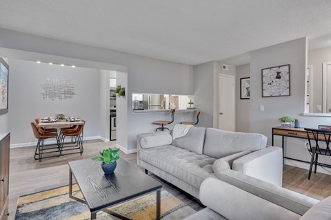 a living room with a couch and a table